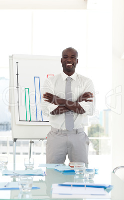 Young Businessman standing before his team