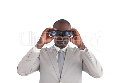 Businessman happy Looking through binoculars