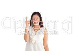 Businesswoman pointing upwards