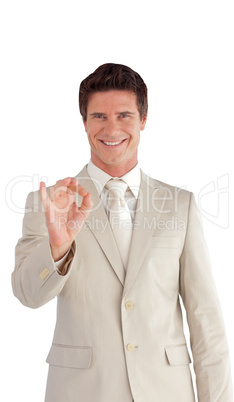 Business man showing Positive sign