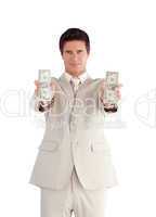 Businessman holding Dollars