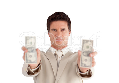 Businessman holding dollars in his hands