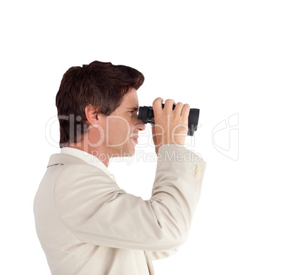 Businessman looking sideways through a binoculars