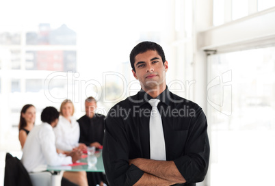 Serious Looking Businessman with arms Folded