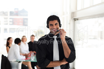 Man smiling on headset