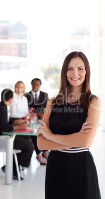 Happy business woman smiling at camera