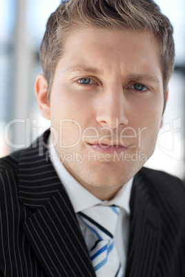 Young Attractive businessman looking at camera