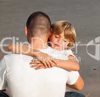 Young Boy Hugging his father