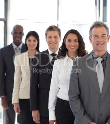 businesspeople from different cultures looking at camera