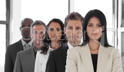 Multi Ethnic Business group looking at Camera