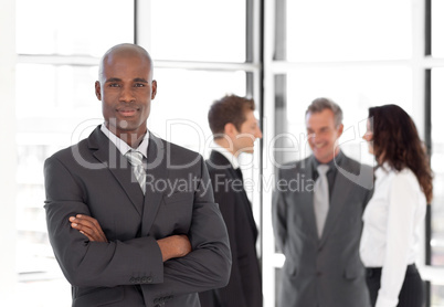 Young Businessman standing out from the Crowd