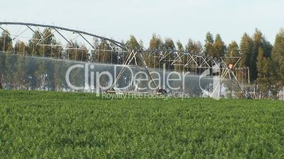 Irrigation pivot spraying water