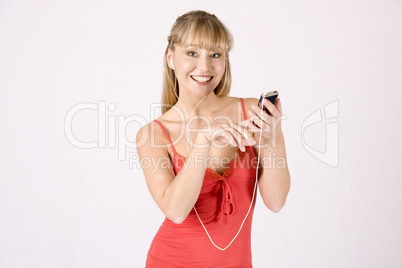 young blond woman with mp3-player