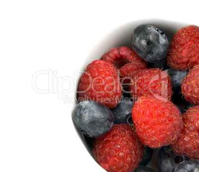 Close up raspberries and blueberries