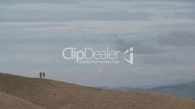 Hikers on a hill