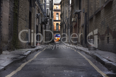 Looking down a long dark back alley