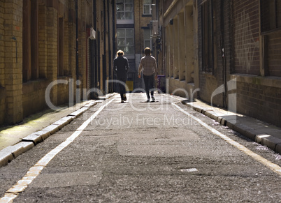 Looking down a long dark back alley