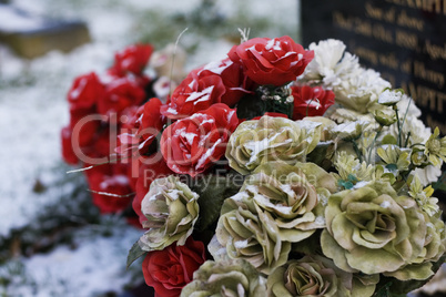 flowers on gravestone