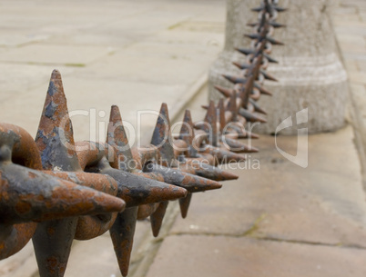 Close up of rusted spiked iron railings