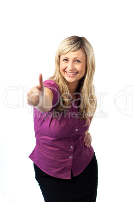 Young woman with her thumb up to camera