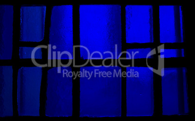 Vibrant dark blue stained glass background image
