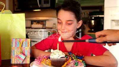 Girl and Birthday Cupcake