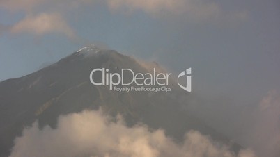 Clouds blowing past the summit of Tunguragua Volcano