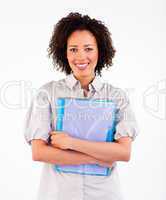 Businesswoman holding folders smiling at the camera