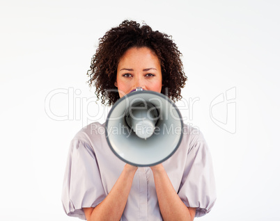 Businesswoman speaking through a megaphone in front of the camera