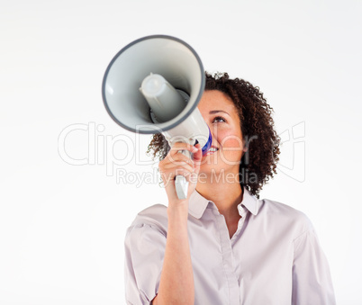 Businesswoman shouting through megaphone