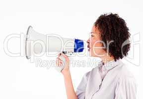 Businesswoman shoutng through megaphone