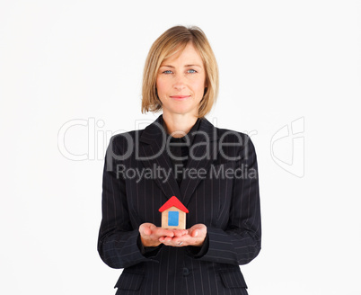 Businesswoman with house for real estate concept