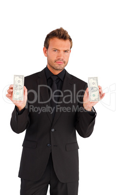 Handsome businessman with bundle of money