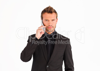 Serious business manager with mobile phone