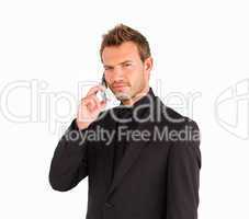 Confident businessman manager on cell phone