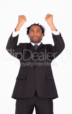 Young businessman with raised arms