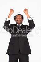 Smiling businessman with raised arms