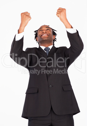 Happy businessman with raised arms