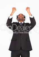 Businessman with raised arms looking upwards