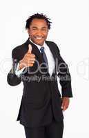 Handsome businessman with thumb up