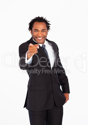 Smiling businessman pointing at the camera