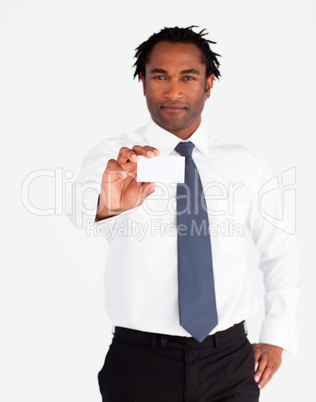 Young businessman holding white card