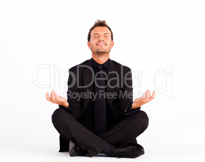 Smiling man doing yoga exercises