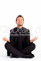 Handsome man meditating