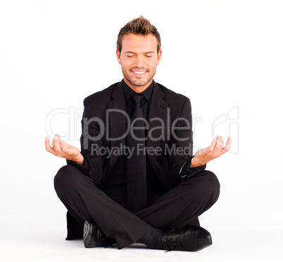 Happy man doing yoga exercises