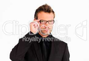Businessman with glasses looking at the camera