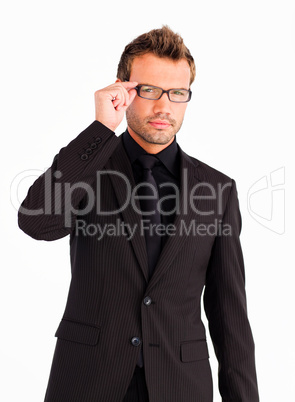 Young businessman with glasses looking at the camera