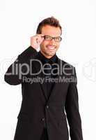 Handsome businessman with glasses looking at the camera