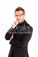 Confident businessman with glasses looking at the camera