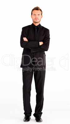 Serious businessman with folded arms